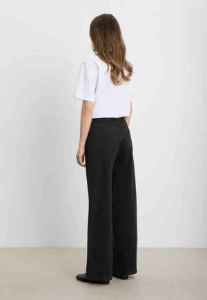Charm Loose jeans - washed black denim from Brand Mission