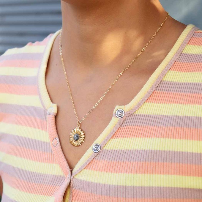 Gold filled halsketting met bronzen/zilveren madeliefje from Fairy Positron