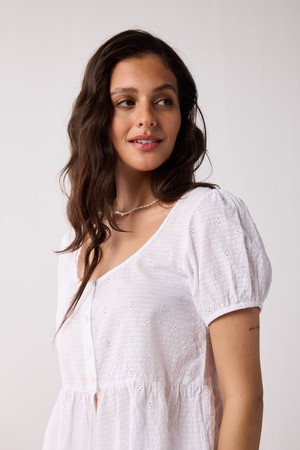 Embroidered Peplum Top with Puff Sleeves in White from Reistor