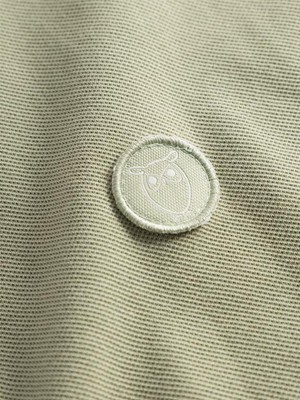 Polo T-Shirt Basic Badge Lichtgroen from Shop Like You Give a Damn