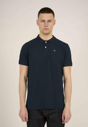 Polo T-Shirt Basic Badge Donkerblauw from Shop Like You Give a Damn