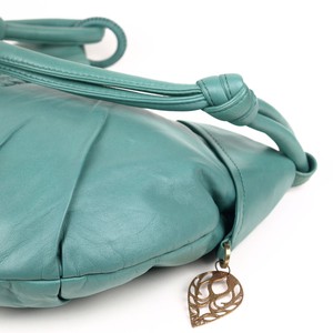 Goa - Sea Green luxury leather shoulder bag with bronze beads and tassels from Treasures-Design