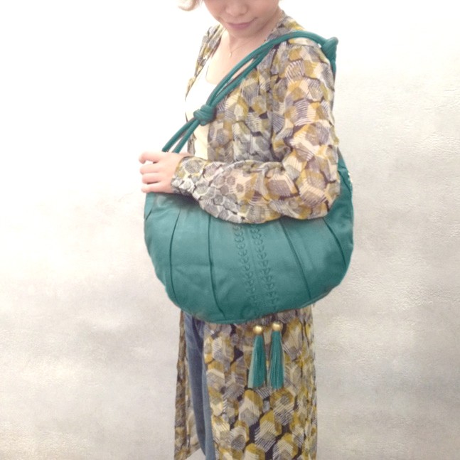 Goa - Sea Green luxury leather shoulder bag with bronze beads and tassels from Treasures-Design