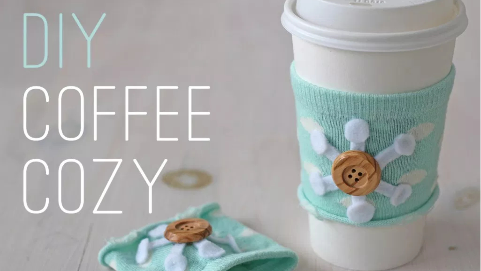 http://splashofsomething.com/2013/11/15/an-easy-peasy-no-sew-craft-to-keep-your-coffee-cozy/